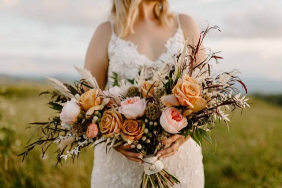 Wedding florals by Blosm Design, shared on Instagram